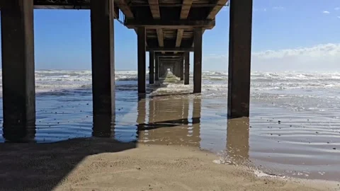 Ocean Waves under a Peer Stock Footage 295712897