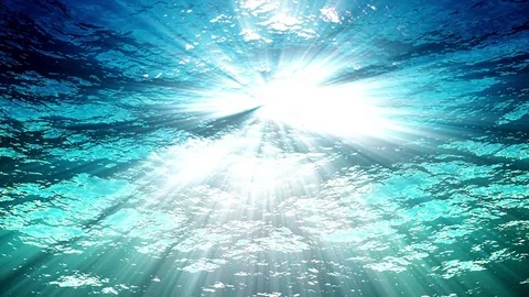 Ocean waves from underwater plankton high quality looping animation. Light rays Stockbeeldmateriaal 83363077
