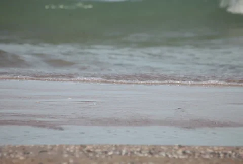 Ocean waves washing beach sand. Stock Footage 37685065