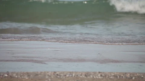 Ocean waves washing beach sand. Stock Footage 37712583