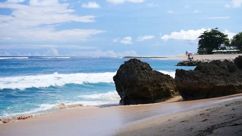 Ocean waves washing over rock on a beach Stock Footage 81216176