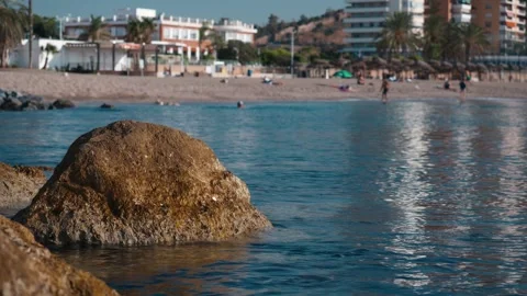 Ocean waves washing over rocks, creating coastal serenity and a tranquil se.. Stock Footage 344059375