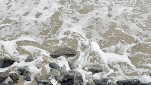 Ocean Waves Washing Over Rocks on a Tropical Sandy Beach, Close-up 스톡 동영상 345185491