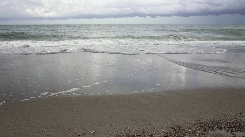 Ocean waves washing sandy beach shoreline time lapse Stock Footage 342577447