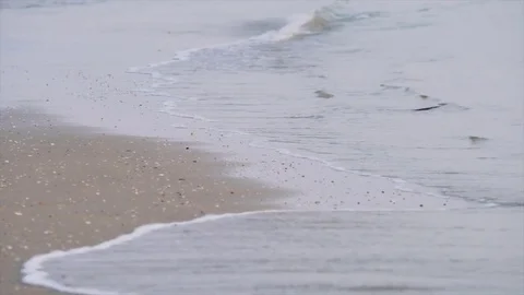 Ocean waves on the wet beach 01 Stock Footage 73608480