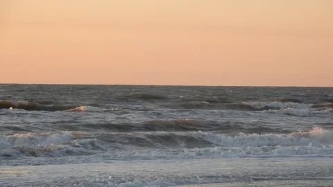 Ocean Waves White Sandy Beach At Golden Orange Sunset 動画素材 127249991