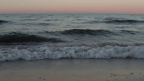 Ocean Whisper: Sunset Waves on a Calm Evening Stock Footage 293684497