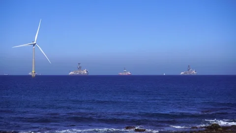 Ocean wind farm generator and oil drilling platforms Stock Footage 127135325