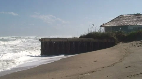 Oceanfront Home With Crashing Large Waves Stock Footage 7902041