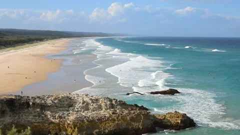  Oceanic coast of Australia. Waves run over the sandy beach, top view. Stock Footage 168166779