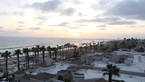 Oceanside beach with palm trees. Oceanside California at sunset Stock Footage 112943125