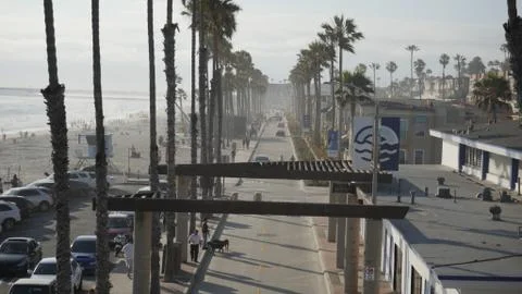 Oceanside CA beach, palm trees and street Stock Photos