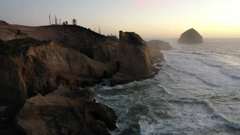 Oceanside Cape Flyby OR Coast Sunset Stock Footage 152792771