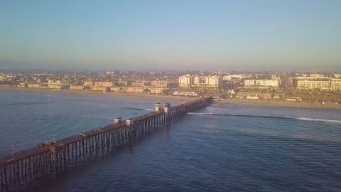 Oceanside Pier drone flight to beach hotels - San Diego, CA Stock-Footage 88258033