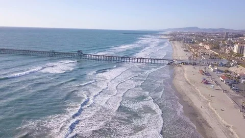 Oceanside pier rising aerial drone shot in San Diego, California Stock Footage