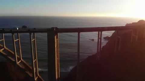 Oceanview flyby with pan to right of Bixby Creek Bridge, California Stock Footage 143438257