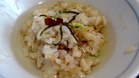Ochazuke hot tea over rice seafood and seaweed Japanese traditional cuisine 4 Stock Footage 286033177