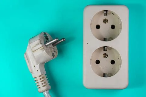Ocket and plug isolated on green Stock Photos