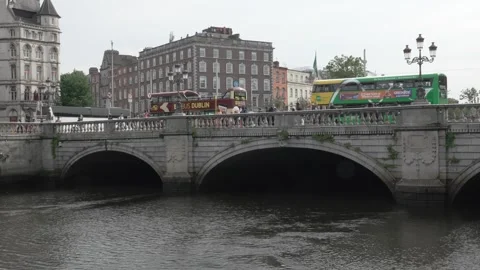 O'Connell Bridge over the River Liffey in Dublin, Ireland at sunset, reflecting Stock Footage 311758745