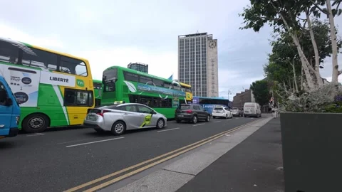 O'Connell Bridge - Traffic and People on a Busy Dublin Street Stock Footage 338224136