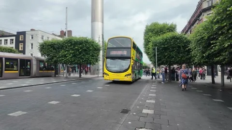 O'Connell Street, Dublin - Commuters and Tourists in City Center Stock Footage 338223701