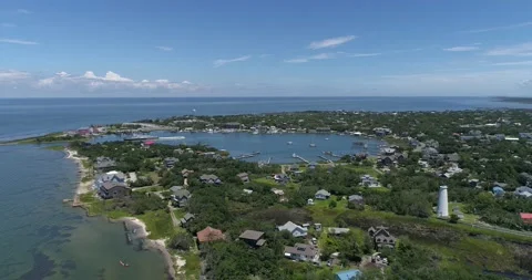 Ocracoke Lighthouse drone shot in the Outer Banks, North Carolina.   Video stock 134911616