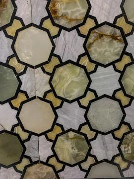Octagonal stone tile pattern with translucent green and cream tones Stock Photos