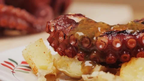 Octopus cooking, chef Boiling fresh octopus on restaurant kitchen, healthy food Stock Footage 296005779