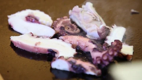 Octopus on hot stone Stock Footage 75343534