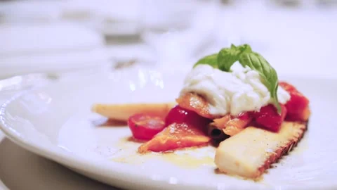 Octopus with stracciatella and vegetables. Stock Footage 147905219