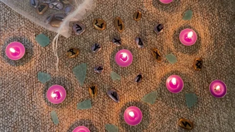 Octultic esoteric rite with divination fortune telling Scandinavian runic stones Stock Footage 337402955