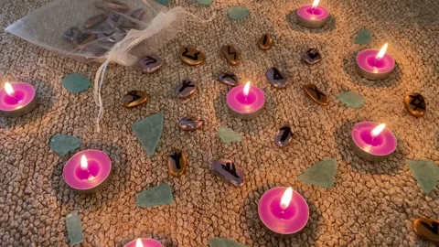 Octultic esoteric rite with divination fortune telling Scandinavian runic stones Stock Footage 337402967