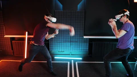 Oculus Rift Quest VR glasses boxing game. Active people virtual reality gaming. Stock Footage 155757541