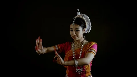 Odissi female asian dancer perform Indian traditional 4k studio black backdrop Stock Footage 126282588
