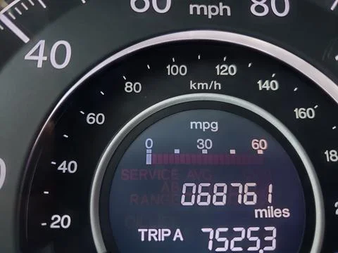 Odometer and Speedometer of a relatively young car Stock Photos