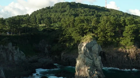 Oedolgae (외돌개) Sea Stack aerial view, Seogwipo, Jeju Island, South Korea Stock Footage 286217029