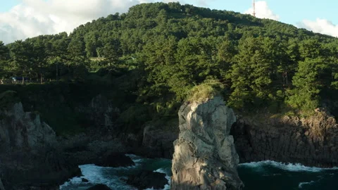 Oedolgae (외돌개) Sea Stack aerial view, Seogwipo, Jeju Island, South Korea Stock Footage 286217462