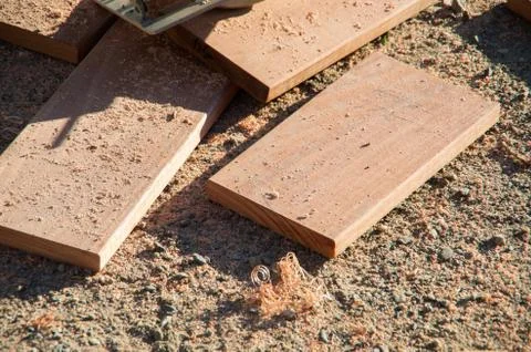 Offcuts of wood piled on the ground Stock Photos