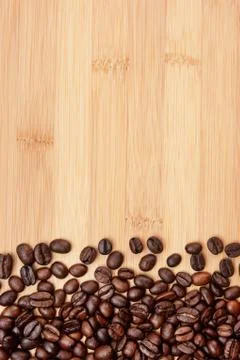 ?offee beans on a wooden texture Stock Photos