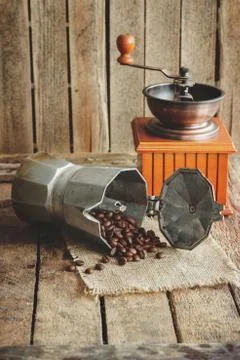 ?offee grinder, coffeepot and roasted coffee beans Stock Photos