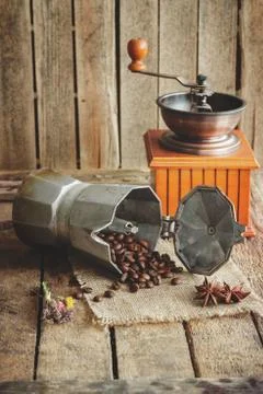 ?offee grinder, coffeepot and roasted coffee beans Stock Photos