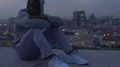 Offended and frustrated guy thinking about meaning of life, sitting on roof edge HD Footage
