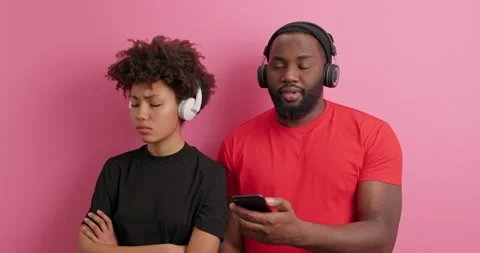 Offended dark skinned woman doesnt want to speak with friend turns away from him Stock Footage 151194555