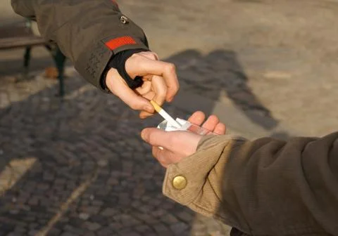 Offer a cigarette Stock Photos