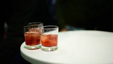 Offering alcoholic punch at the party Stock Footage 71119216