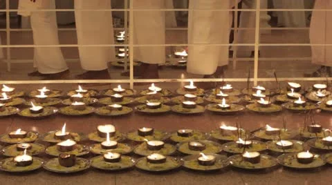 Offering ceremony with handmade candles in ashram Stock Footage 22225635