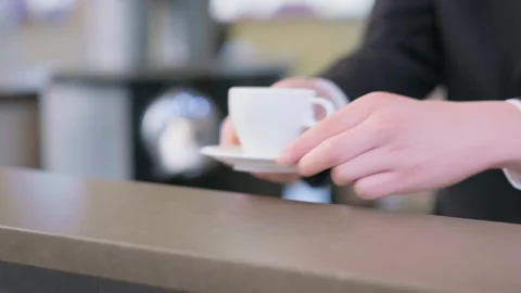 Offering a cup of coffee in a hotel Stock Footage 289088371