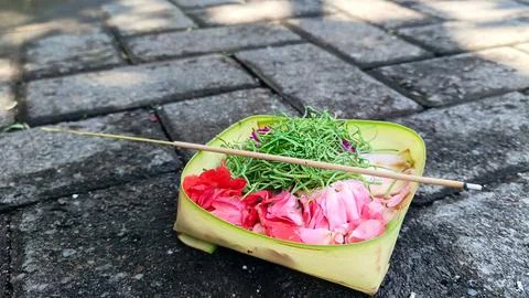 Offering flowers in Bali Stock Photos