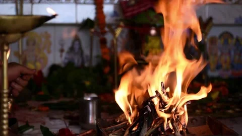 Offering prayer to God in front of holy fire Stock Footage 134711253