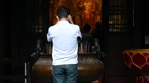 Offering prayers Stock Footage 234798426